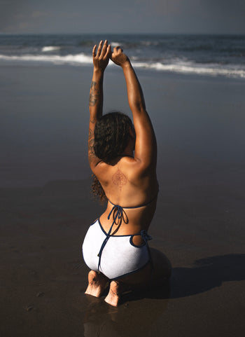Sailor Brief, reversible Coastal Blue side, paired with Oyster Top, back view